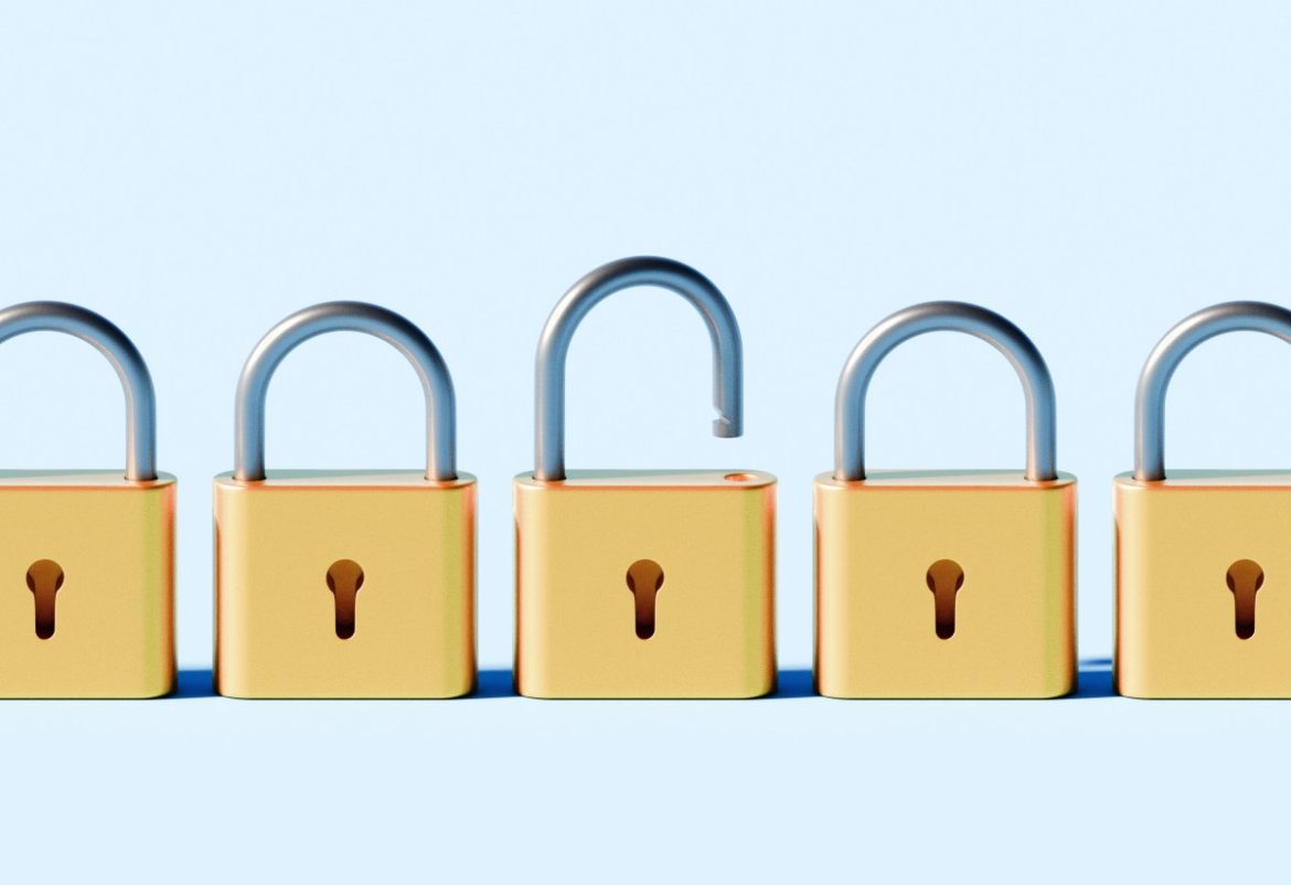 Conceptual stock image depicting a linear row of identical padlocks, all securely locked except for one that is open.