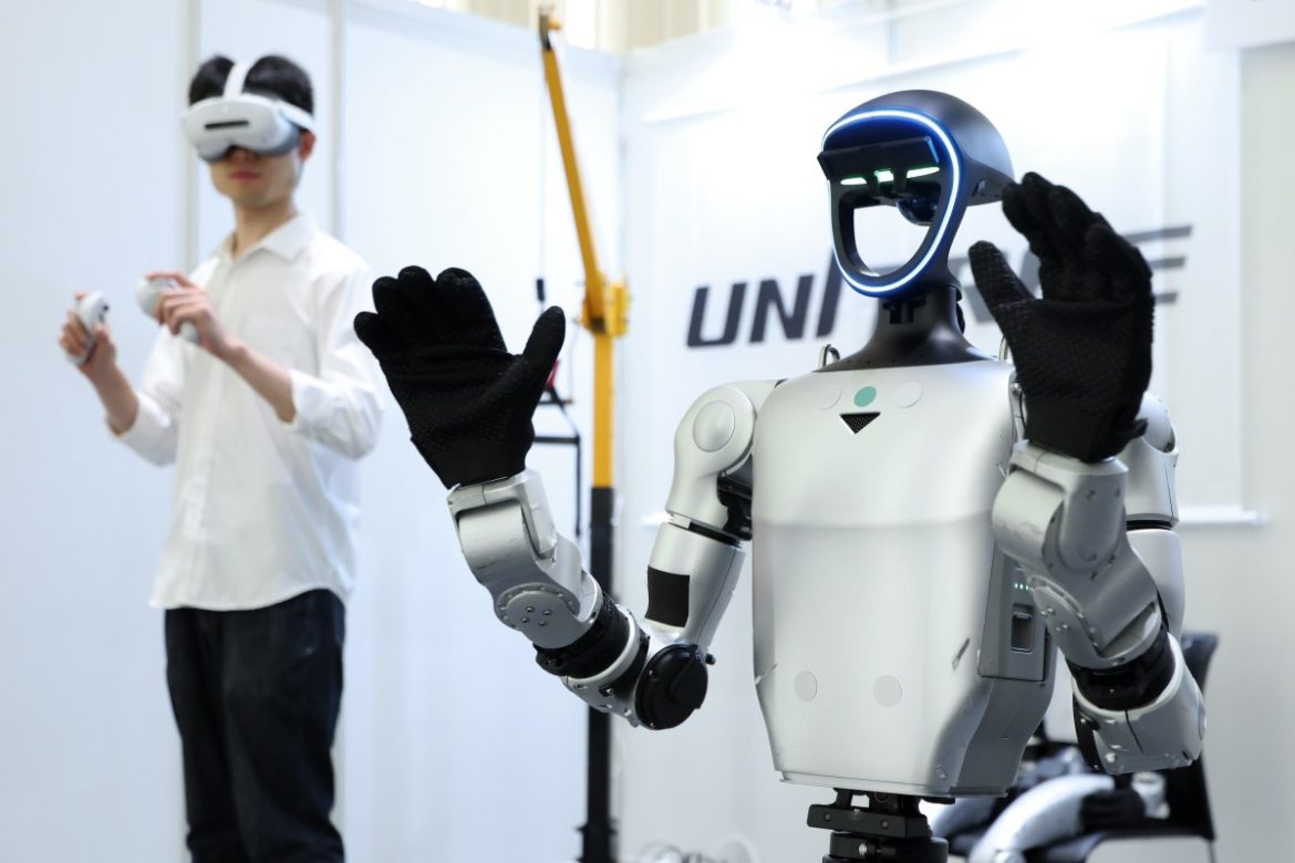 An exhibitor demonstrates a Unitree Robotics G1 humanoid robot at the Humanoids Summit in Tokyo, Japan, on Friday, May 29, 2026. The summit is scheduled to continue through May 29. Photographer: Kiyoshi Ota/Bloomberg